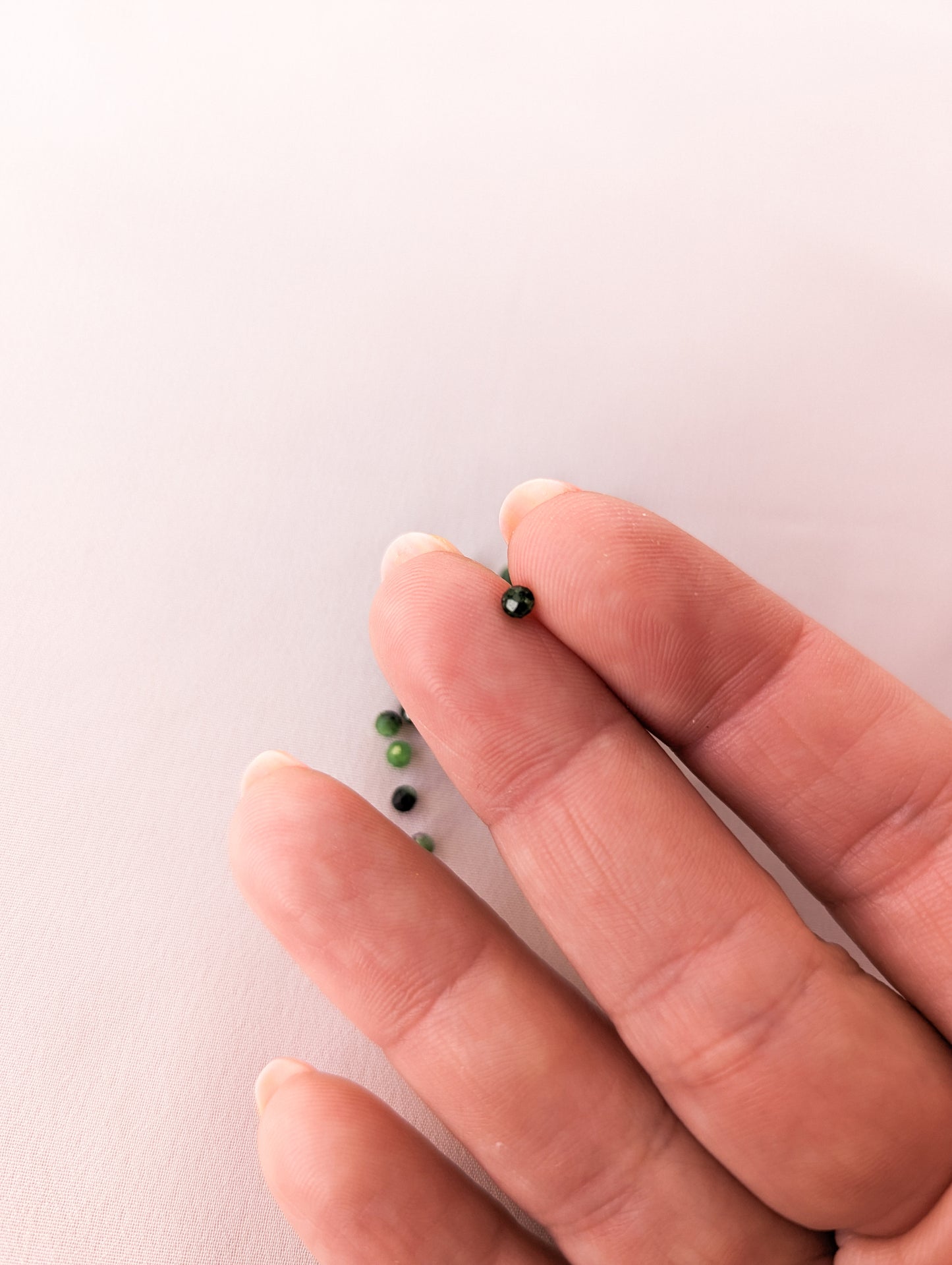 3mm Faceted Round - Ruby in Zoisite