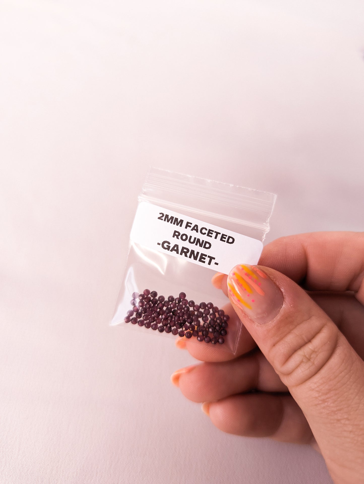 2mm Faceted Round - Garnet Grade AAA