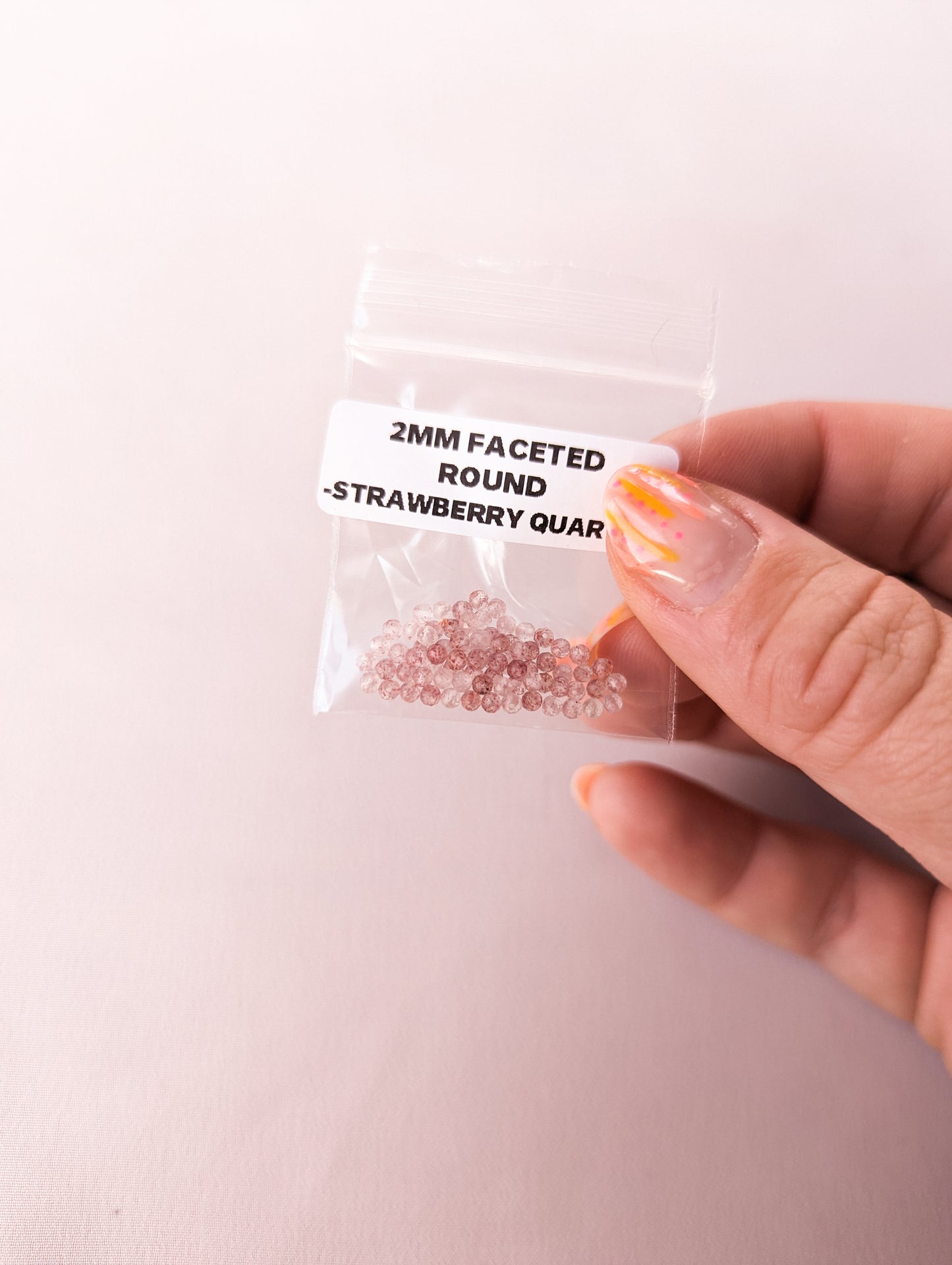 2mm Faceted Round - Strawberry Quartz Grade AAA